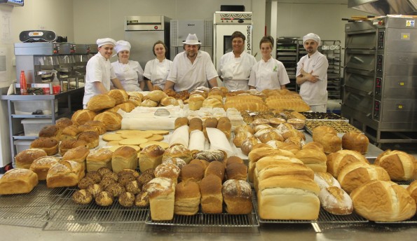 Trainees with LYS' Bakery Project display their award winning produce